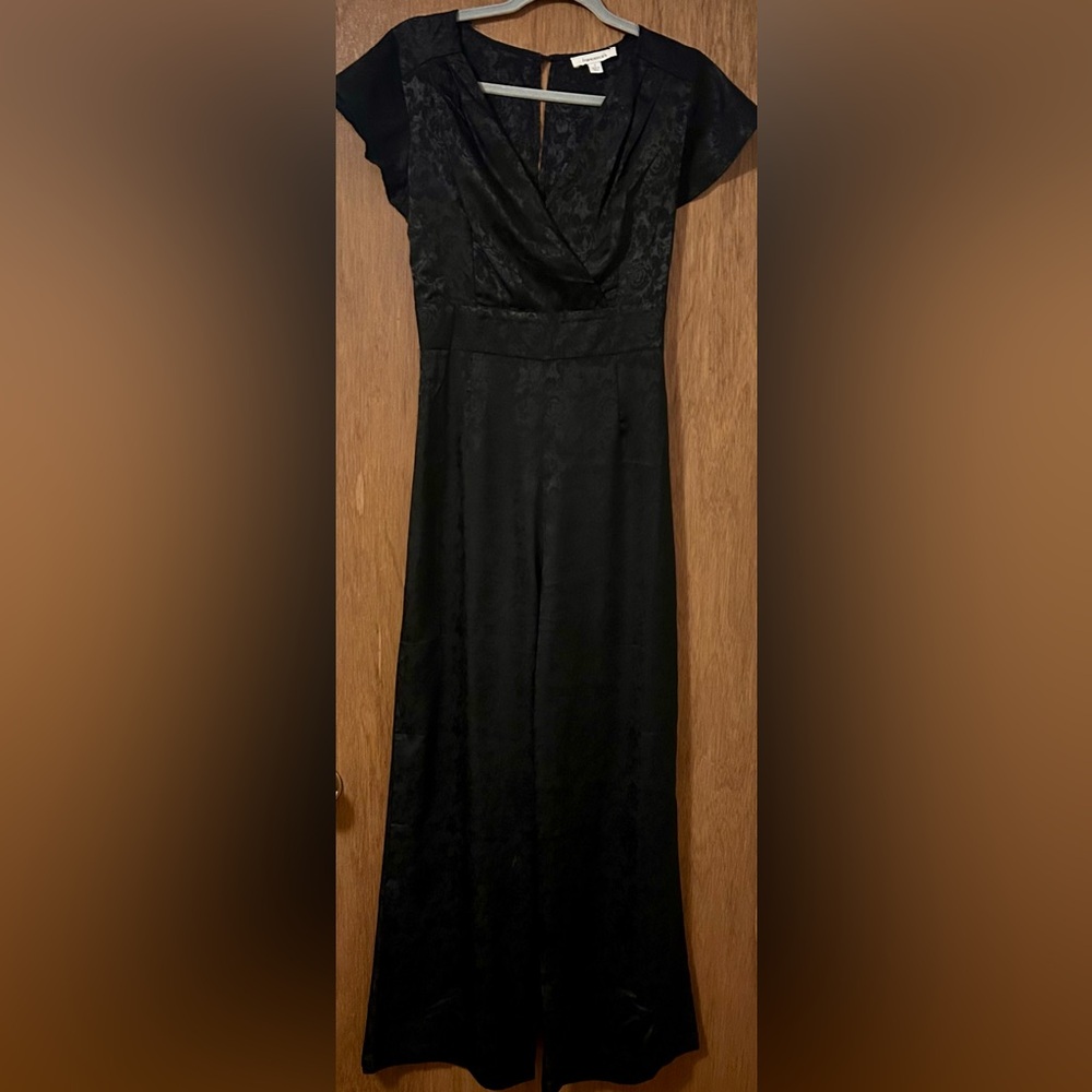 Francesca’s silky black jumpsuit
